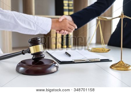 Handshake After Good Deal Negotiation Cooperation, Professional Female Lawyer Or Counselor And Clien