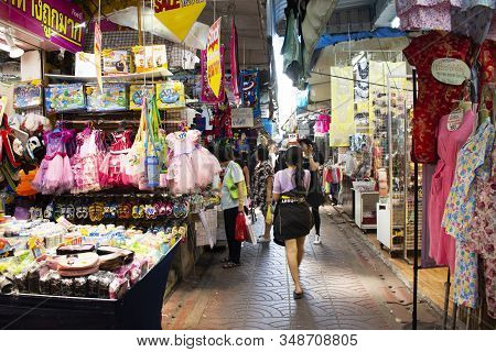 Thai People Walking Select And Buying Fabric Material With Accessories From Garment Shop In Sampeng