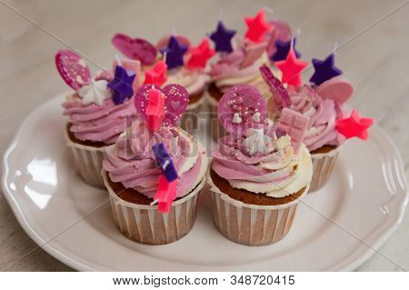 Tasty Cupcakes For Birthday Party With Stars Decorations On A White Wooden Table. Cakes Decorated Wi