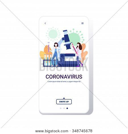Microbiologists Holding Tube Coronavirus Biological Sample For Analysis In Laboratory Microscope Epi