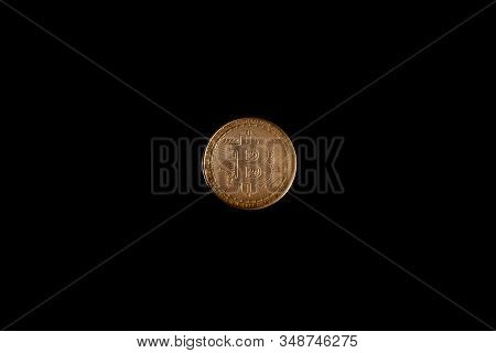 Bitcoin Coin On A Black Background, Stock Photo.