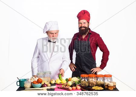 Professional Culinary. Bearded Men Chefs In Uniform. Ready To Cook. Healthy Food. Chef With Assistan