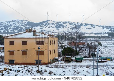 View Of The Snowy Mountains With The Electric Mills In Barracas