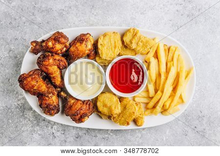 Table Fof Tasty Snacks For Beer Prepared For Watching Sports On Tv. Chicken. Chicken Wings, Chicken 