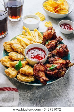 Table Fof Tasty Snacks For Beer Prepared For Watching Sports On Tv. Chicken. Chicken Wings, Chicken 