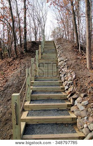 Looking Uphill At A Steep Incline With A Well Built Stairway Giving Good Access For The Walkers And 