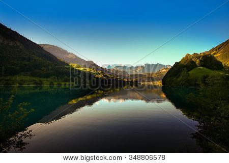 Lake Lungern Switzerland - Famous Fishing Lake In Switzerland, Reflection In Water