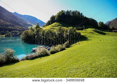 Lake Lungern Switzerland - Famous Fishing Lake In Switzerland. Reflection In Water