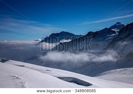 Jungfraujoch - Up In The Mountains, With Snow, Blue Sky And Mountains
