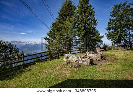 Swiss Alps Landscape Up In Rigi Kaltbad, With Trees, Mountains And Blue Sky