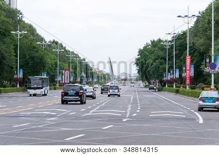China, Heihe, July 2019: Roadway With Pedestrian Crossings On The Streets Of The Chinese City Of Hei