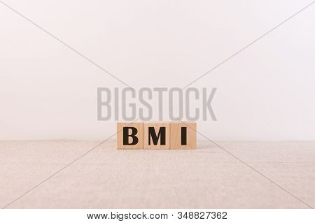 Bmi Body Mass Index Letter Blocks On Wooden Cubes On A Light Background