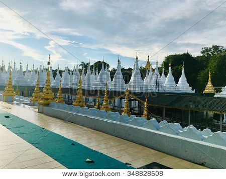 Many White And Gloden Small Buddhist Stupa At Sandamuni Pagoda In Mandalay City, Myanmar