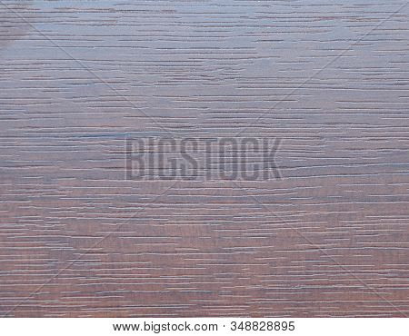 Mahogany, Pale Red Texture Of Wood Drawing On A Slice Closeup.