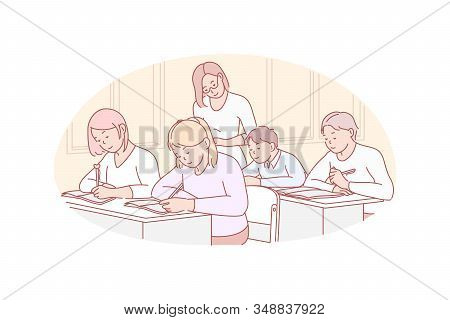 Education, Teaching, School Concept. Young Teacher Examinates School Children. Concentrated Group Of