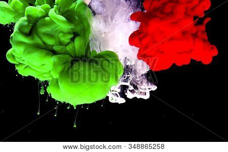 Flag Of Italy From Colored Ink On A Black Background.