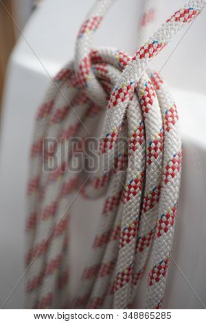 Close Up Of Coiled Up Rope, Halyard On Deck Of A Sailingboat