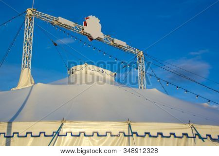 Circus Tent With Two Towers. Big Top Circus. The Image Of A Circus On A Background Of Blue Sky.