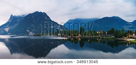 Night View Of Traunsee Lake In Upper Austria In Summertime. Dramatic Cloudscape Evening Scenery With