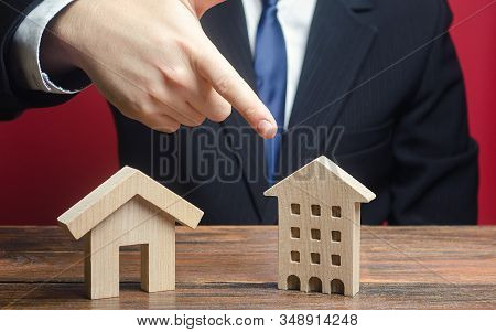 A Man Prefers To Choose A Apartment Residential Building Rather Than An Private House. Definition Fo