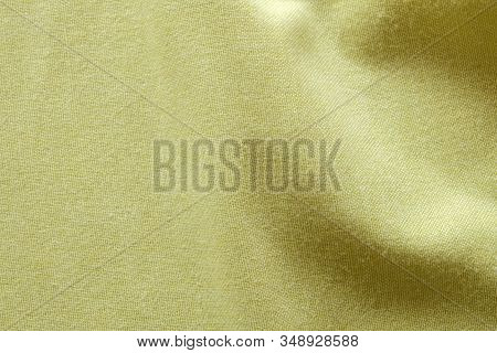 Bright Yellow Pastel Cloth Fabric Basket Weave Texture. Cotton Made Shirt Close Up Shot. Smooth And 