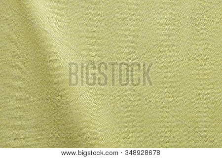 Bright Yellow Pastel Cloth Fabric Basket Weave Texture. Cotton Made Shirt Close Up Shot. Smooth And 
