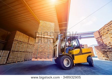 Forklift Loader Load Lumber Into A Dry Kiln. Wood Drying In Containers.