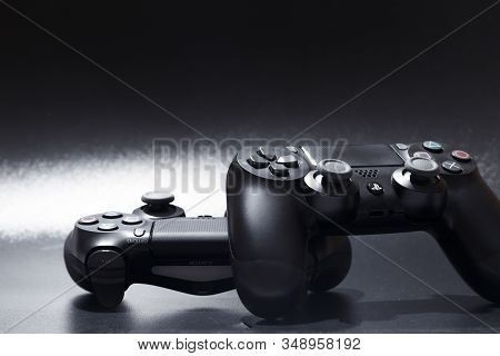 Russia, Oktober 24 2019: Game Joystick. Playstation. On A Blue Background Top View. The New Sony Dua