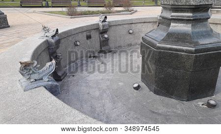 Various Benches And Small Architectural Forms In Park
