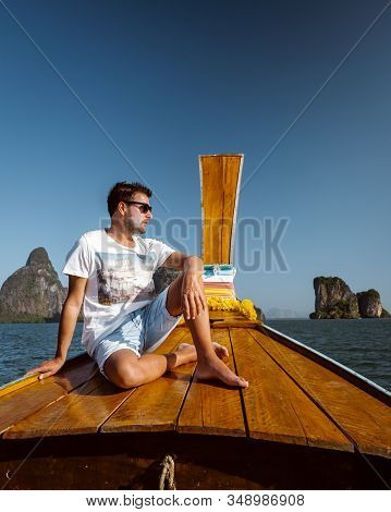 Young Men On Vacation In Thailand Visiting The Bay Of Phannga Famous For Its James Bond Island And V