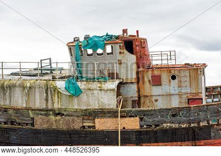 The Old Fishing Boat On The Shingled Shoreline Of Loch Linnhe Near Fort William , Scotland Highland,