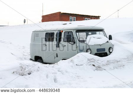 Novyy Urengoy, Russia - April 2, 2020: Russian Offroad Van Uaz 3909 Covered With A Snow.