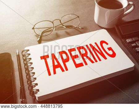 Taper Tantrum Concept; Global Economic World Market Reacting To The Fed Tapering Off. Word Text Typo