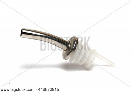 Close Up Of Bottle Top Pourer For Dosing Alcoholic Drinks Into Small Glasses On White Background Liq