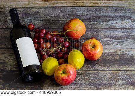 Chilled Wine Bottle With Blank Label With Fruits On The Side