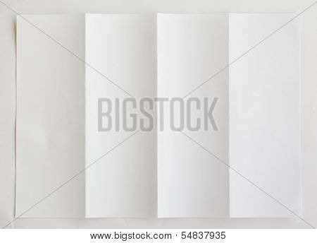 White Textured Sheet Of Paper Folded