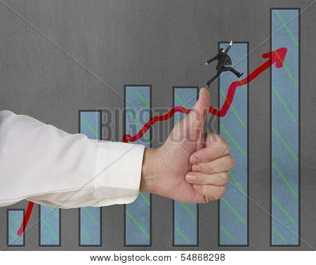 Businessman Jumping On Growing Red Arrow With Thumb Up