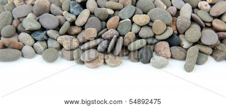 Small sea stones, isolated on white