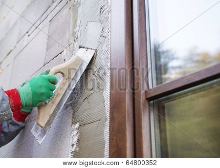 Man plastering