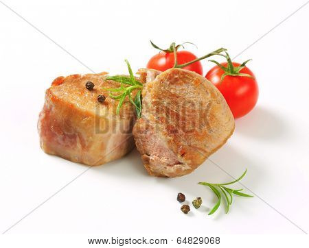 medium rare baked pork tenderloin with fresh cherry tomatoes