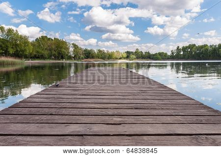 Old Wooden Jetty At A Lake
