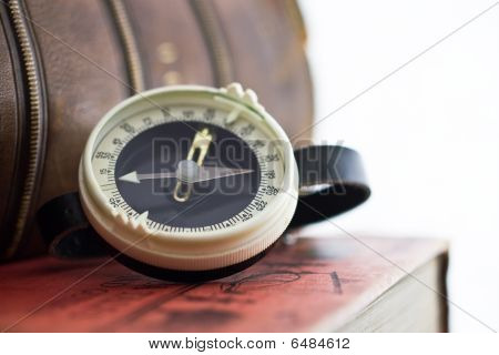 Compass and books