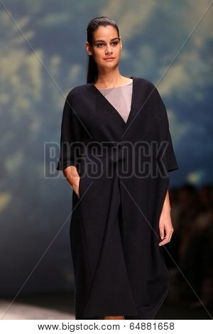 ZAGREB, CROATIA - MAY 09: Fashion model wearing clothes designed by Iva Karacic on the Zagreb Fashion Week on May 09, 2014 in Zagreb, Croatia.