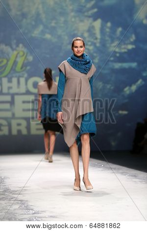 ZAGREB, CROATIA - MAY 09: Fashion model wearing clothes designed by Iva Karacic on the Zagreb Fashion Week on May 09, 2014 in Zagreb, Croatia.
