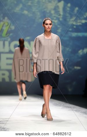 ZAGREB, CROATIA - MAY 09: Fashion model wearing clothes designed by Iva Karacic on the Zagreb Fashion Week on May 09, 2014 in Zagreb, Croatia.