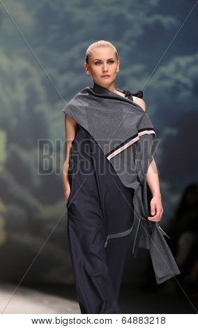 ZAGREB, CROATIA - MAY 09: Fashion model wearing clothes designed by Iva Karacic on the Zagreb Fashion Week on May 09, 2014 in Zagreb, Croatia.