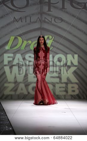 ZAGREB, CROATIA - MAY 09: Fashion model wearing clothes designed by Avaro Figlio on the Zagreb Fashion Week on May 09, 2014 in Zagreb, Croatia.