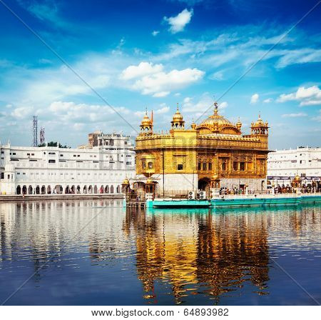 Vintage retro effect filtered hipster style travel image of Sikh gurdwara Golden Temple (Harmandir Sahib). Amritsar, Punjab, India