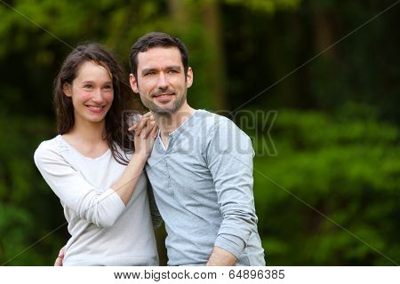 Portrait Of A Young Happy Couple In The Nature