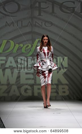 ZAGREB, CROATIA - MAY 09: Fashion model wearing clothes designed by Avaro Figlio on the Zagreb Fashion Week on May 09, 2014 in Zagreb, Croatia.